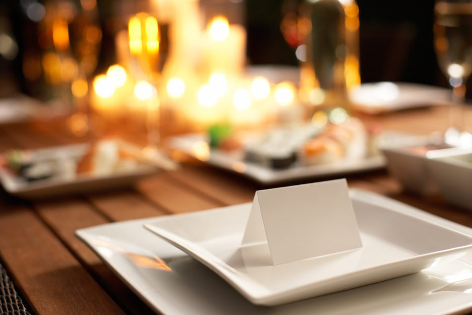 Place card on table set for dinner party