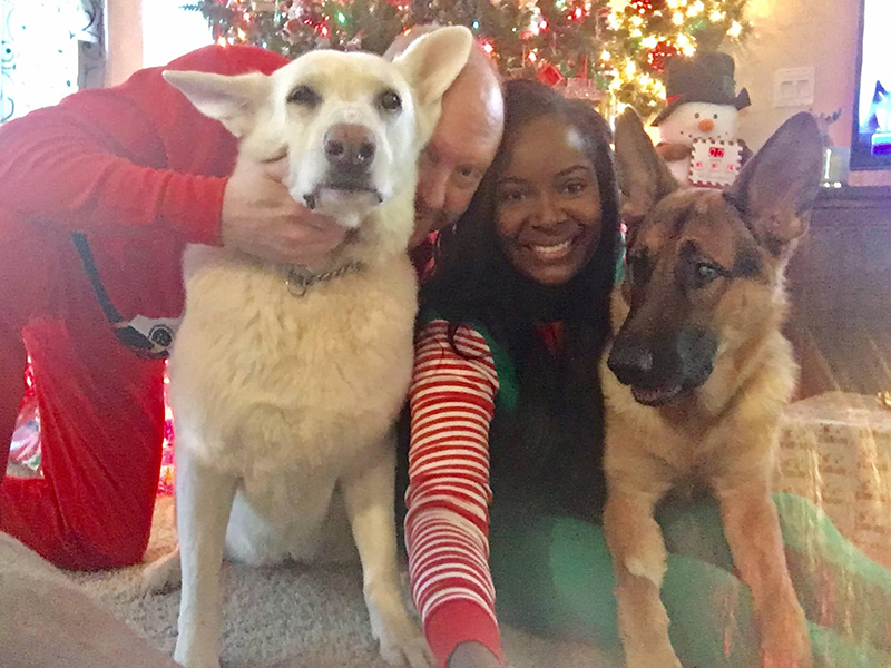 Here we have some behind the scenes chaos of trying to wrangle the mutts for a Christmas photo and, lastly, a full body shot of us dressed in our Christmas onesies